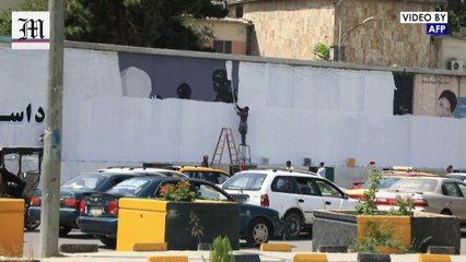Taliban removes and repaints walls in Kabul