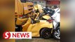 Miraculous escape for Myvi driver in multiple vehicle crash