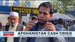 Thousands queue at Kabul's banks after Taliban impose withdrawals cap