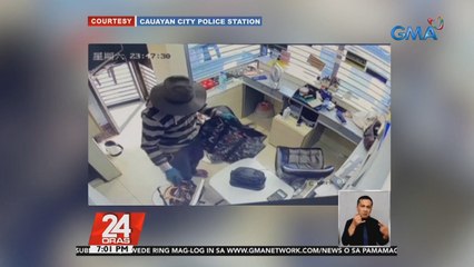 Nasa P100,000 na halaga ng cash at alahas, sinimot ng dalawang salarin sa niloobang sanglaan | 24 Oras