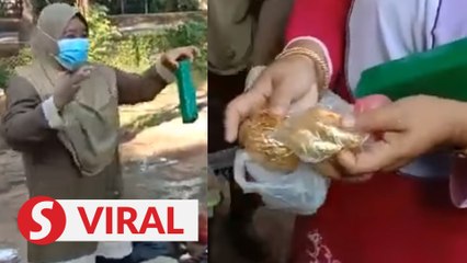 Woman recovers RM70,000 worth of gold jewellery after accidentally throwing them away
