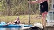 Adventurous Amputee Hops On and Plops Off Paddle Board