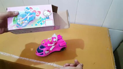 Unboxing and Review of hello kitty  music light swing toy car for gift