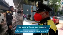 “Estoy para ayudar a la gente”, dice policía que ayudó al tránsito durante inundaciones