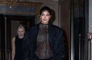 Kylie Jenner Took a Maternity Style Cue from Sister Kim Kardashian in a Sheer Lace Jumpsuit