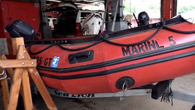 Firefighters rush to save lives amid rising floodwaters