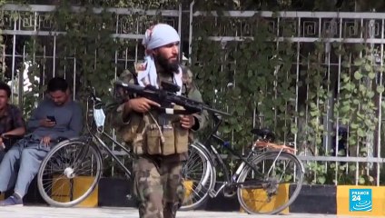 Kabul airport: Women head back to work as civilian flights resume