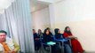 Curtain divides classroom for Afghan male-female students