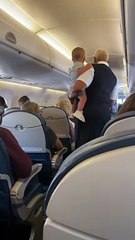 Flight Attendant Calms Fussy Baby