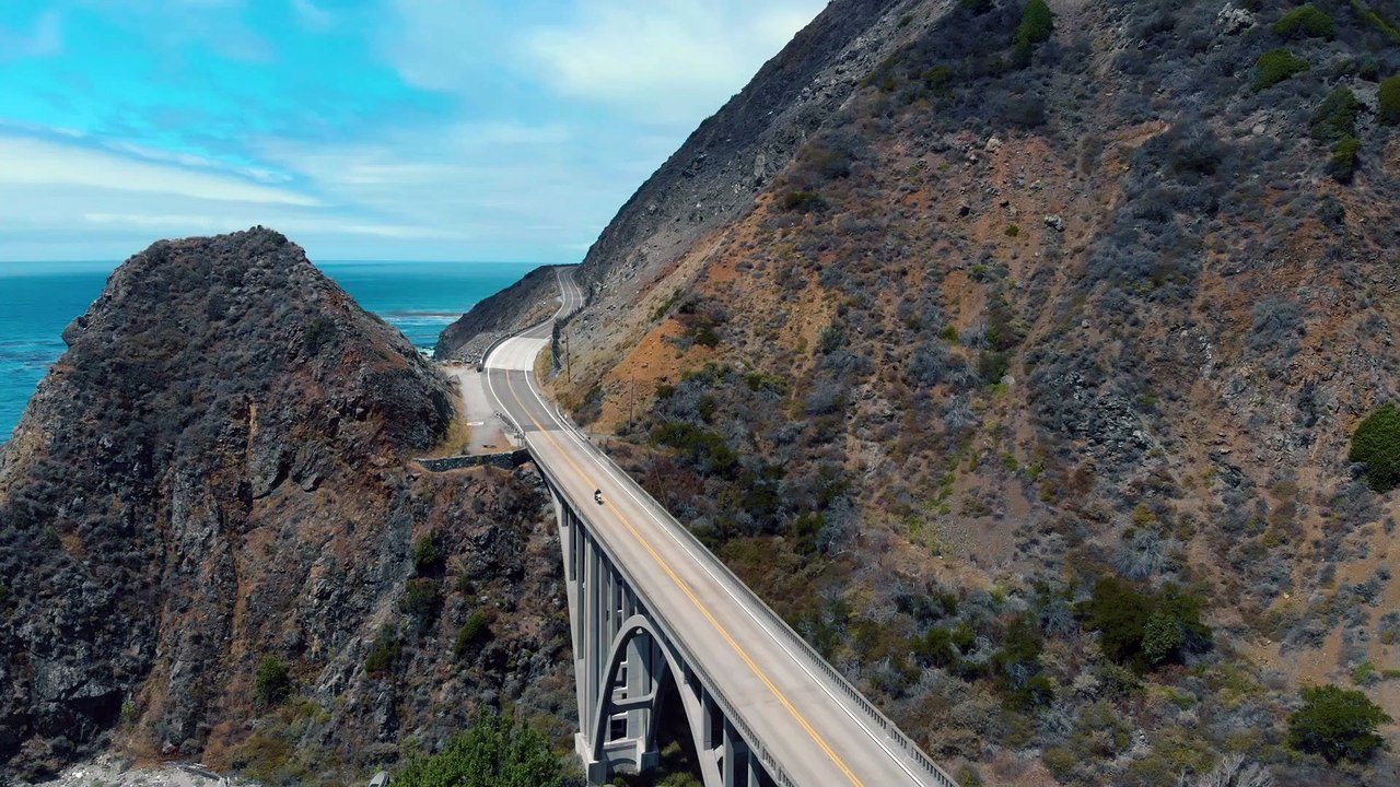The Big Creek Bridge Connecting Highway One On The California Coastline