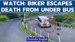 Gujarat: A biker miraculously escapes death after seemingly fatal accident in Dahod | Oneindia News