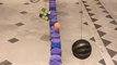 Man Puts Small Ball Into Glass By Throwing It On a Line Of Plastic Cups And Moving Through Obstacles