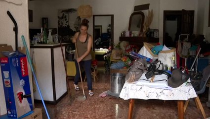 French town cleans up after flooding