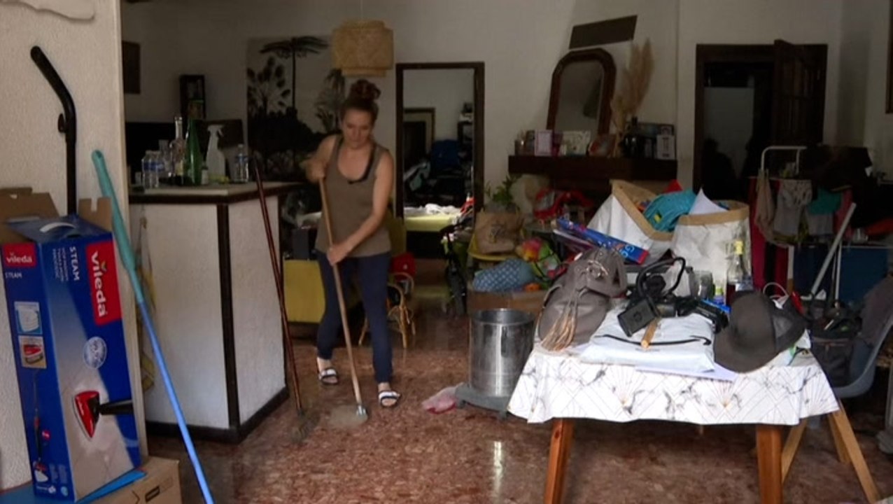 French town cleans up after flooding