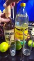 tequila cabrito reposado con agua mineral de manantial topo chico y limones una bebida refrescante muy parecida a la margarita  con hielo