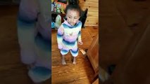Child Tries to Use Scissors to Cut Dog's Pompoms