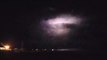 Consistent Flashes of Thunder Appear in Night Sky During Storm