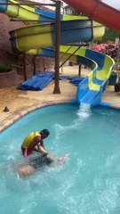 Lifeguard Saves Woman at Water Slide