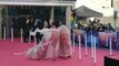 The wrapping is off - with less than an hour to go, a massive pair of glittering red heels make their debut outside the  Everybody's Talking About Jamie Movie  premiere