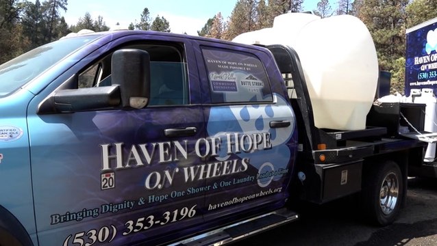 Volunteers offer mobile laundry, showers to wildfire survivors