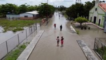 Venezuelan villagers try to salvage their livelihoods after severe floods