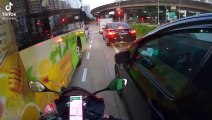 Considerate and Kind Driver folds his side mirrors to allow a motorcycle through