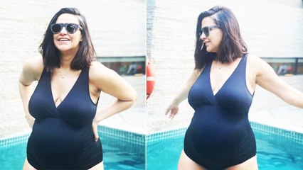 Download Video: Neha Dhupia Flaunts Her Baby Bump In A Swimsuit