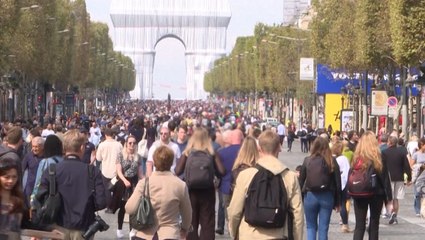 Sunny 'car-free' day brings crowds of Parisians to the Champs-Elysees