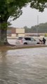 Soldier Witnesses Man Pushing His Car In Flooded Street And Decides To Help Him