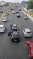 Good Samaritan Helps Push Stalled Car Off Highway