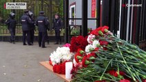 Russians gather to mourn victims of campus shooting spree