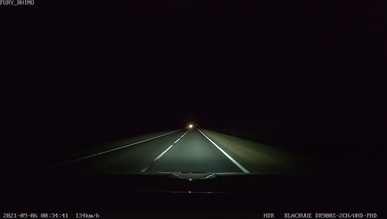 Driver Surprised by Stranded Car During Night Drive