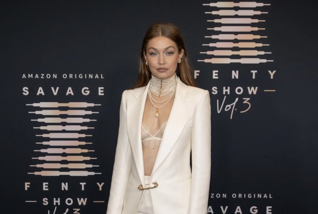 Gigi Hadid Wore Sheer Lingerie Under a Blazer Fastened With a Safety Pin