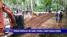 Momen Ibu yang Hendak Bersalin Harus Ditandu Lewati Sungai Kering untuk ke Puskesmas