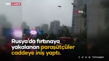 Fırtınaya yakalanan paraşütçüler caddeye iniş yaptı