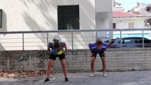 Duo Performs Different Balancing Tricks While Juggling Footballs