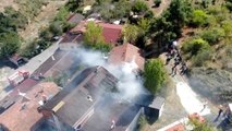 Ümraniye'de kömürlükte çıkan yangın 2 binanın çatısına sıçradı-Ümraniye'de korkutan yangın havadan görüntülendi