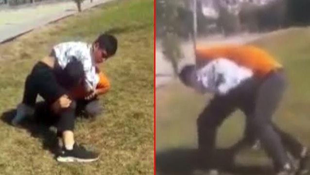 Tekme tokat kavga eden arkadaşlarını Boğazını sık, kafasına vur diye tezahürat ederek videoya aldılar