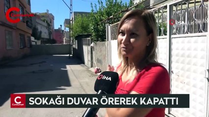 Tapulu arazisinden geçtiği iddiasıyla yola duvar ördürdü