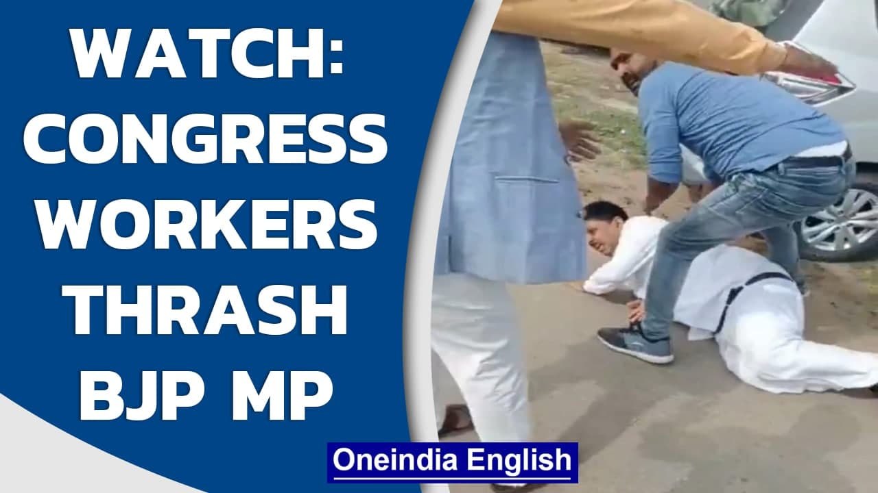 UP: BJP Pratapgarh MP Sangam Lal Gupta gets thrashed allegedly by Congress workers  | Oneindia News