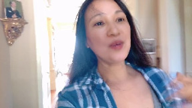 Lady Confronts Bear Going Through Garbage