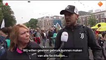 Demonstranten in Den Haag- 'Ik ben een mens, geen code'