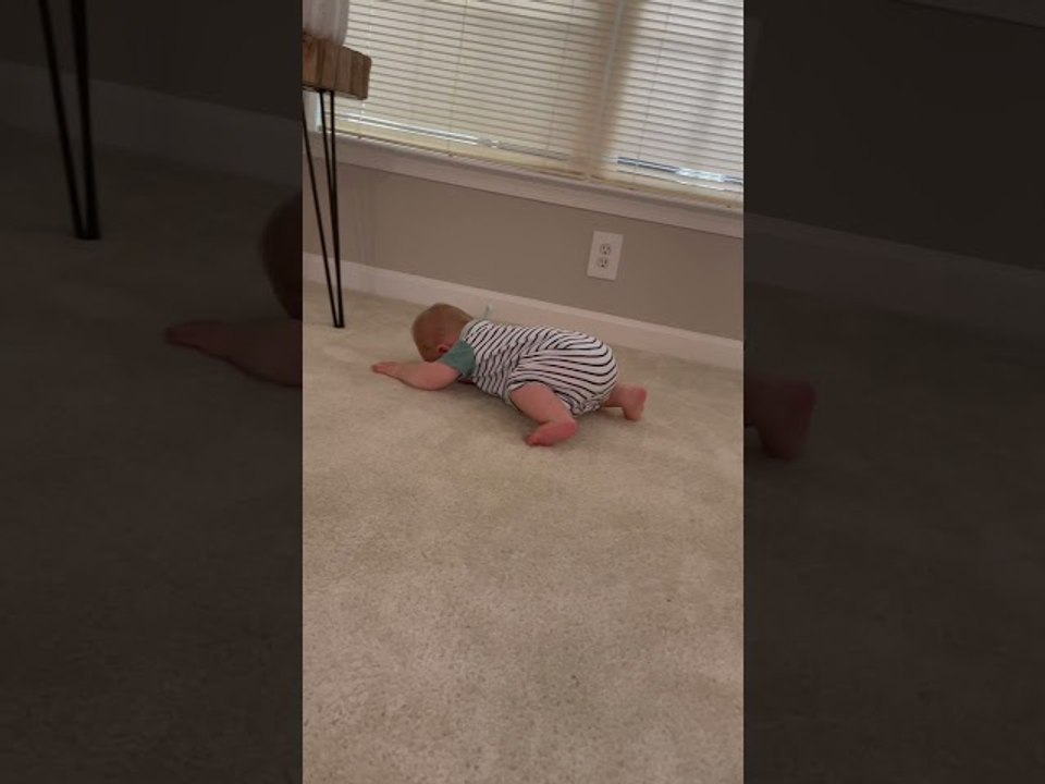 Baby Crawls Face First Across the Floor