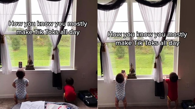 'Adorable twin babies copy mom by acting as if they are making a TikTok '