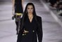 Dua Lipa Made Her Runway Debut in a Power Suit with Ab-Baring Cutouts