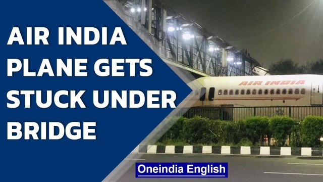 Air India plane gets stuck under foot over bridge in Delhi | Oneindia News