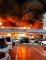 السيطرة على حريق طال 8 معارض سيارات في دبي