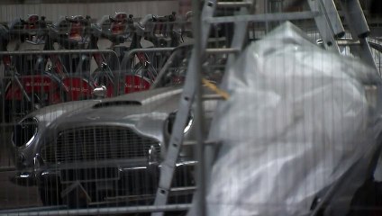 Battered Bond car arrives ahead of No Time To Die premiere