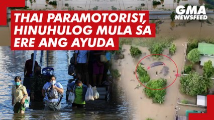 Thai paramotorist, hinuhulog mula sa ere ang ayuda sa mga binaha | GMA News Feed