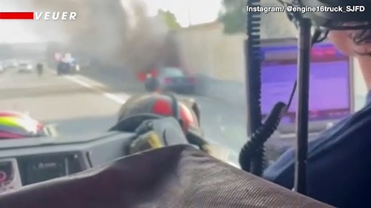 Watch as Rookie Cop Risks Life to Save Driver From Burning Vehicle